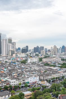 Bangkok, Thailand - May 26, 2018 : Cityscape and building of city in storm clouds sky from skyscraper of Bangkok. Bangkok is the capital and the most populous city of Thailand.