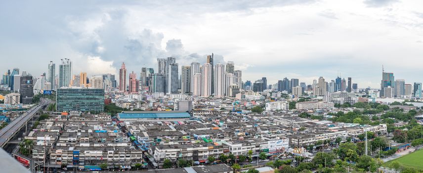 Bangkok, Thailand - May 26, 2018 : Cityscape and building of city in storm clouds sky from skyscraper of Bangkok. Bangkok is the capital and the most populous city of Thailand.