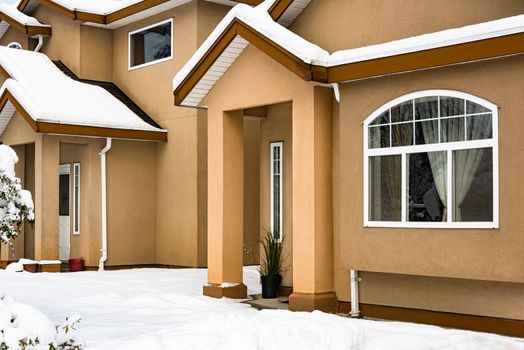 Facade of residential house on winter season in Canada