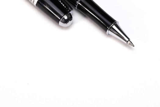 a black and silver fountain pen, isolated on white background