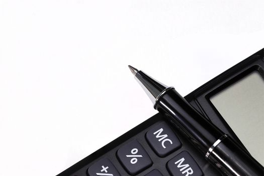a black pen and a black calculator, isolated on white background