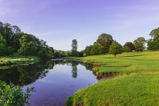 a bend in the River Bela at Dallam Park, Milnthorpe, Cumbria, UK