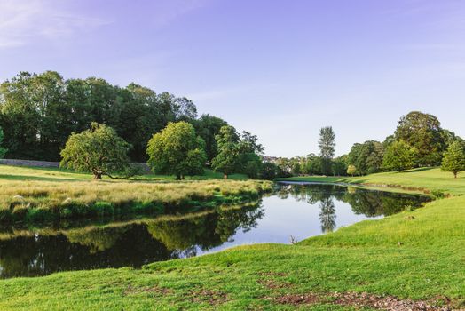 a bend in the River Bela at Dallam Park, Milnthorpe, Cumbria, UK