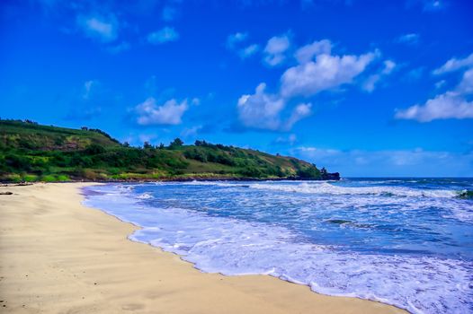 The beach along the coast of Kauai, Hawaii.