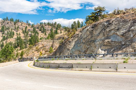 Tight bend of mountain road in Okanagan valley, British Columbia