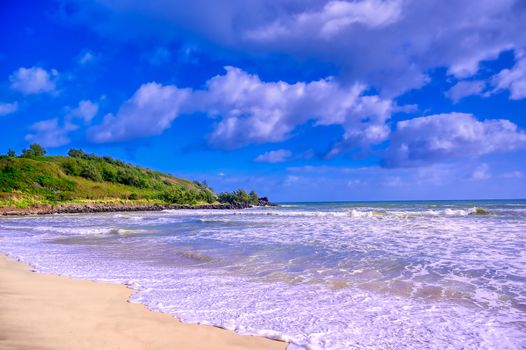 The beach along the coast of Kauai, Hawaii.