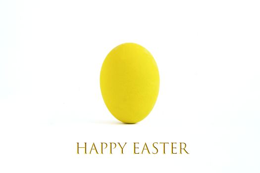 An easter egg painted with yellow color, isolated on white background