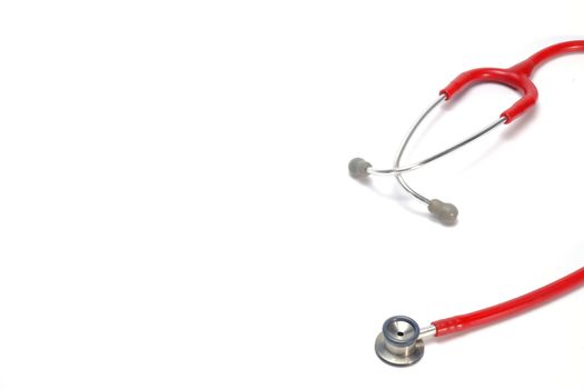 a red stethoscope isolated on white background
