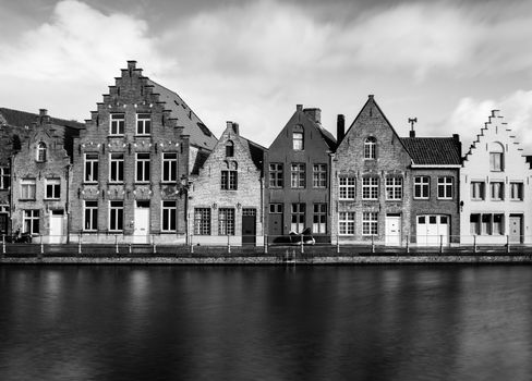Old houses in Bruges (Brugge), Belgium. Black and white, long exposure photography