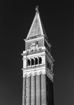 Black and white photo of  the bell tower up close, St Mark's Basilica in Venice, popular landmark, Italy