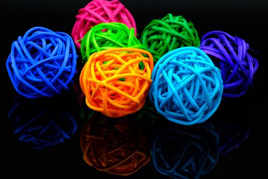 colorful rattan ball for decoration on black background