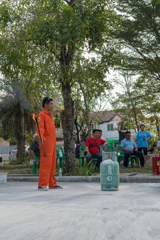 Bangkok, Thailand - January 31, 2016 : Many people preparedness for fire drill and training to use a fire safety tank in village at Bangkok Thailand.