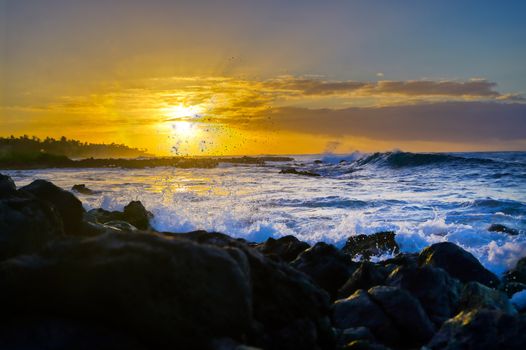 Sunrise over the coast of Kauai, Hawaii.