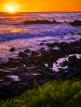 Sunset over the coast of Kauai, Hawaii.