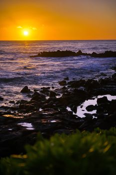 Sunset over the coast of Kauai, Hawaii.