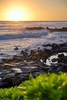 Sunset over the coast of Kauai, Hawaii.