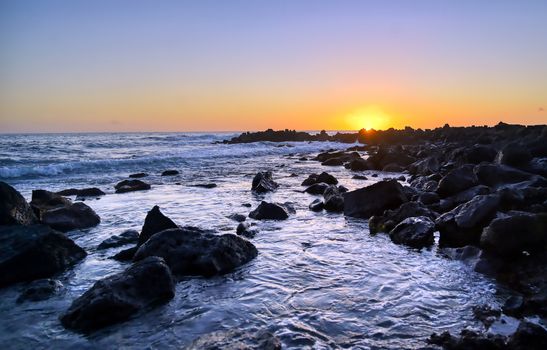 Sunset over the coast of Kauai, Hawaii.