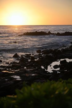 Sunset over the coast of Kauai, Hawaii.