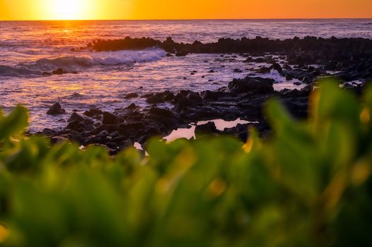 Sunset over the coast of Kauai, Hawaii.