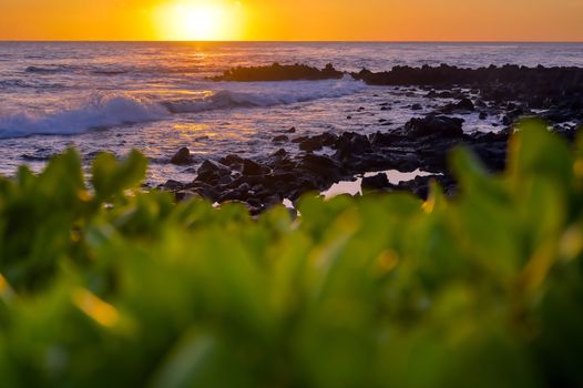 Sunset over the coast of Kauai, Hawaii.