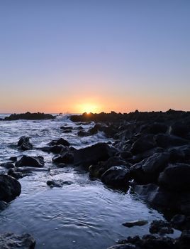 Sunset over the coast of Kauai, Hawaii.