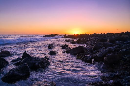 Sunset over the coast of Kauai, Hawaii.