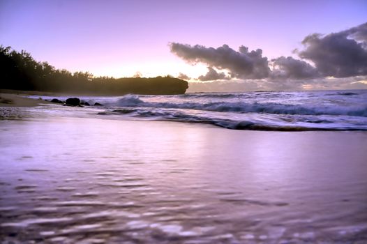 The sunrise over the beach in Kauai, Hawaii