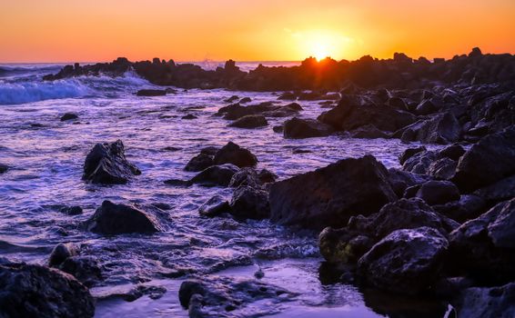 Sunset over the coast of Kauai, Hawaii.