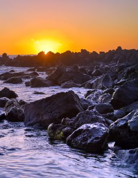 Sunset over the coast of Kauai, Hawaii.