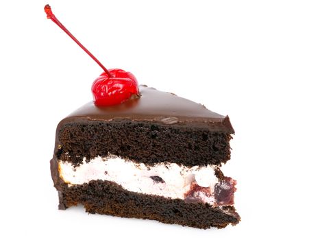 Side view shot of a slice of chocolate cake with cherries and cream filling and chocolate fudge (black forest cake) , isolated on white background