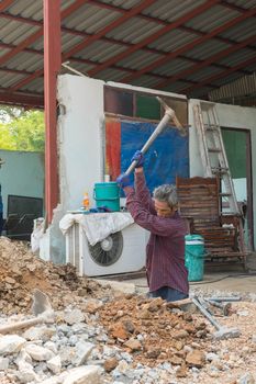 Bangkok, Thailand - February 20, 2016 : Unidentified worker dig a floor for build a home.
