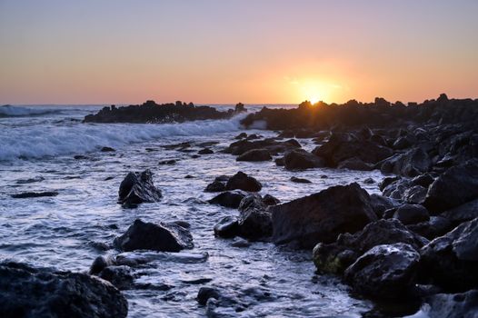 Sunset over the coast of Kauai, Hawaii.