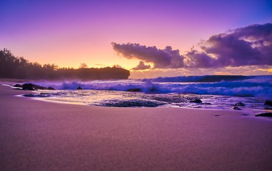 The sunrise over the beach in Kauai, Hawaii