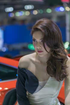 Bangkok, Thailand - December 10, 2015 : Unidentified model pretty lady on display in car show event. This a open event no need press credentials required.