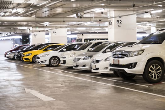 Bangkok Thailand :- june 6, 2020: Parking lot in the building with Orderly park the car along the dividing line
