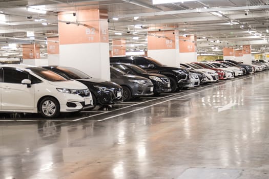 Bangkok Thailand :- june 6, 2020: Parking lot in the building with Orderly park the car along the dividing line