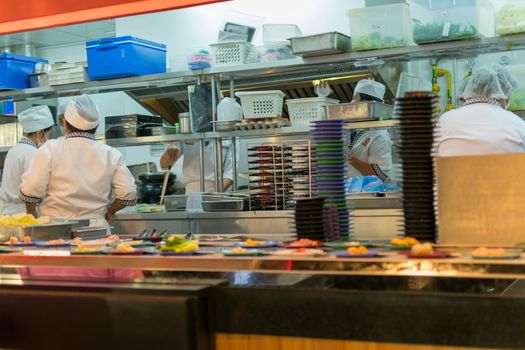 Bangkok, Thailand - December 30, 2015 : Unidentified chefs cooking in the Japan restaurant Kitchen