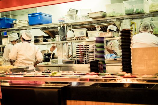 Bangkok, Thailand - December 30, 2015 : Unidentified chefs cooking in the Japan restaurant Kitchen