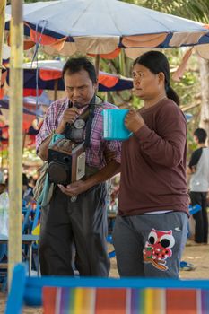 Rayong, Thailand - December 31, 2015 : Unidentified people blind sing a song at LaemMaePhim beach.