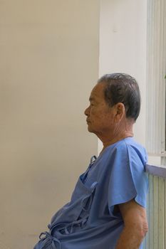 Bangkok, Thailand - July 19, 2015 : Unidentified patient elderly waiting a doctor and nurse in hospital