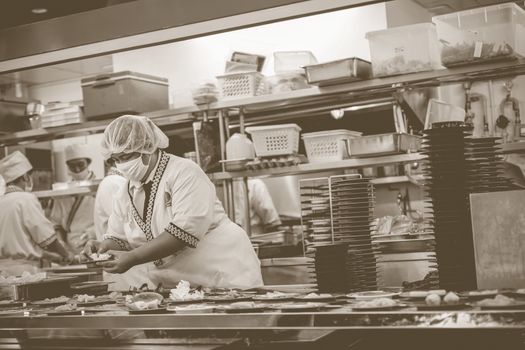 Bangkok, Thailand - December 30, 2015 : Unidentified chefs cooking in the Japan restaurant Kitchen