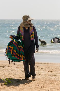 Rayong, Thailand - December 31, 2015 : Unidentified people travel at LaemMaePhim. This white sandy cape can be easily reached from city. Without large waves, the beach is nice for swimming.