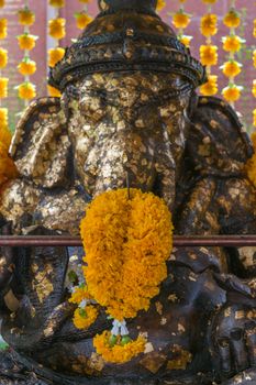 Bangkok, Thailand - August 29, 2015 : Ganesha God of wisdom statue at Wat Hua Lamphong. Wat Hua Lamphong is a Royal Buddhist temple, third class, in the Bang Rak District of Bangkok, Thailand.