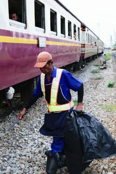 Bangkok, Thailand - September 5, 2015 : Unidentified railway employees working for restoration the railroad tracks before serving at State Railway of Thailand.
