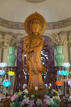 Samut Prakan, Thailand - March 19, 2016 : Guanyin statue at Erawan Museum is a museum in Samut Prakan, Thailand. It is well known for its giant three-headed elephant art display.