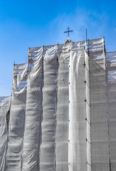 Scaffold construction to renovate church tower building