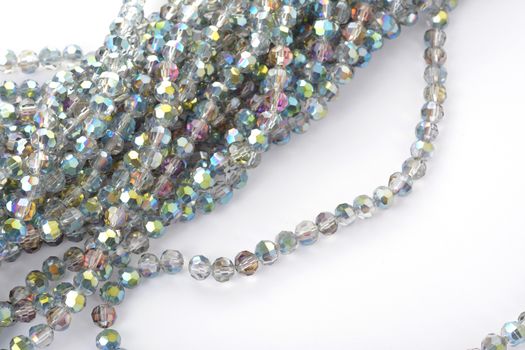 Beautiful color silver gray Glass Sparkle Crystal Isoalted Beads on white background. Use for diy beaded jewelry