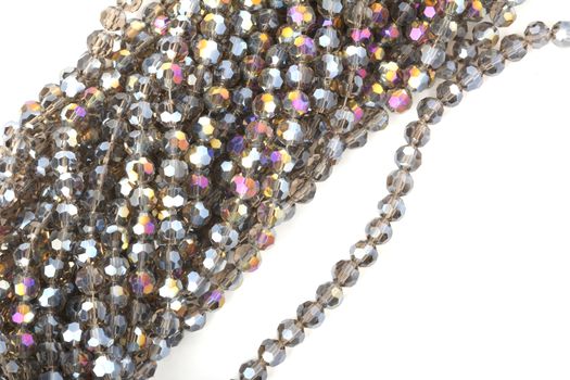 Beautiful color silver gray Glass Sparkle Crystal Isoalted Beads on white background. Use for diy beaded jewelry