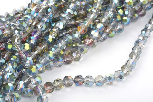 Beautiful color silver gray Glass Sparkle Crystal Isoalted Beads on white background. Use for diy beaded jewelry