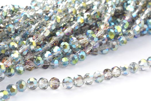 Beautiful color silver gray Glass Sparkle Crystal Isoalted Beads on white background. Use for diy beaded jewelry